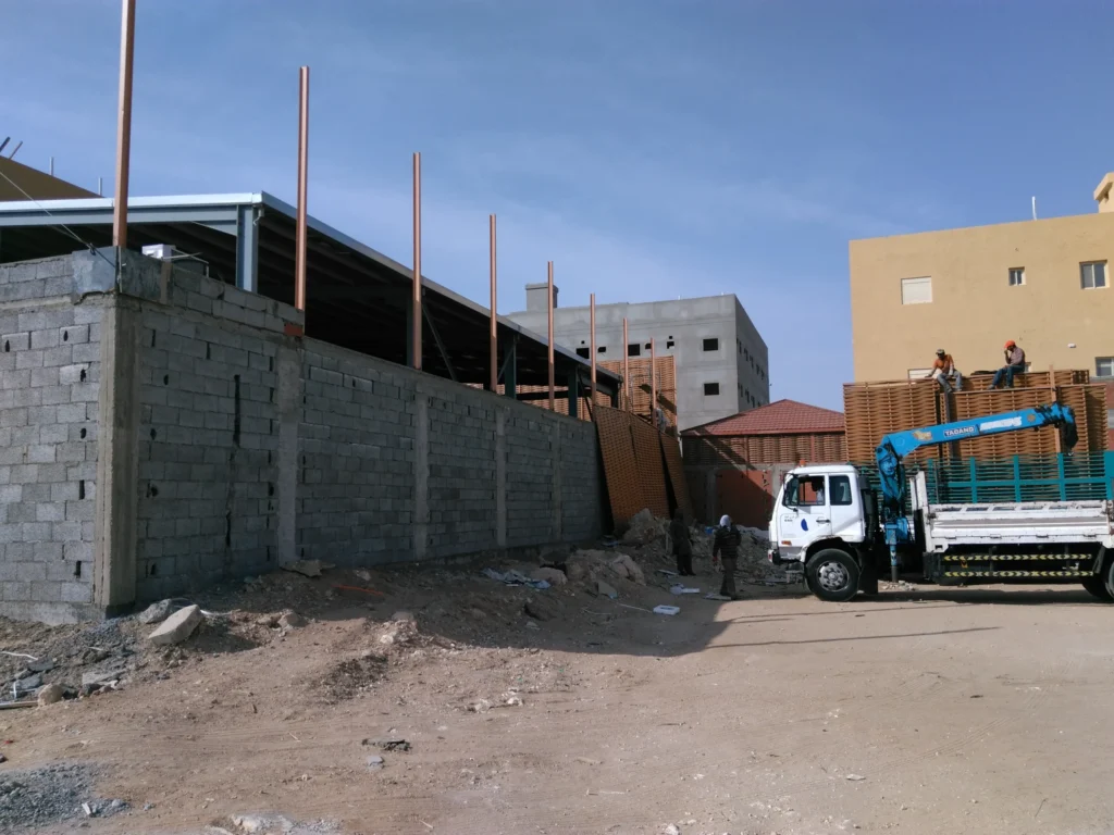 Wood Partition — Plywood & Zinc Fencing — KBH Construction (photo 3)